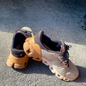 On running shoes. Size 7. Tan and grey.